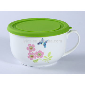 ceramic bowl with handle and lid